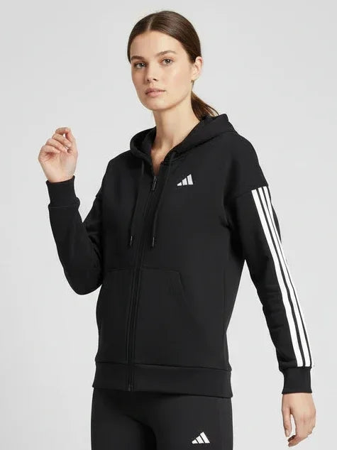 Modella indossa ADIDAS FELPA DONNA JE1283 nera 3 stripes